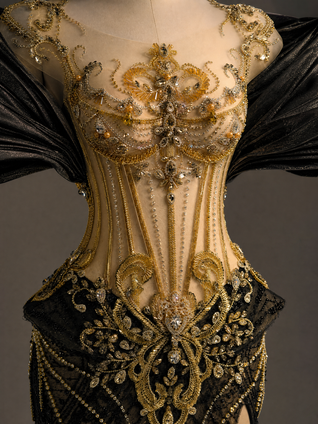 Black and Gold Mermaid Pleated Sleeves Corset Evening Gown — couture detail view (source SKU-076) — reviewed generated product image