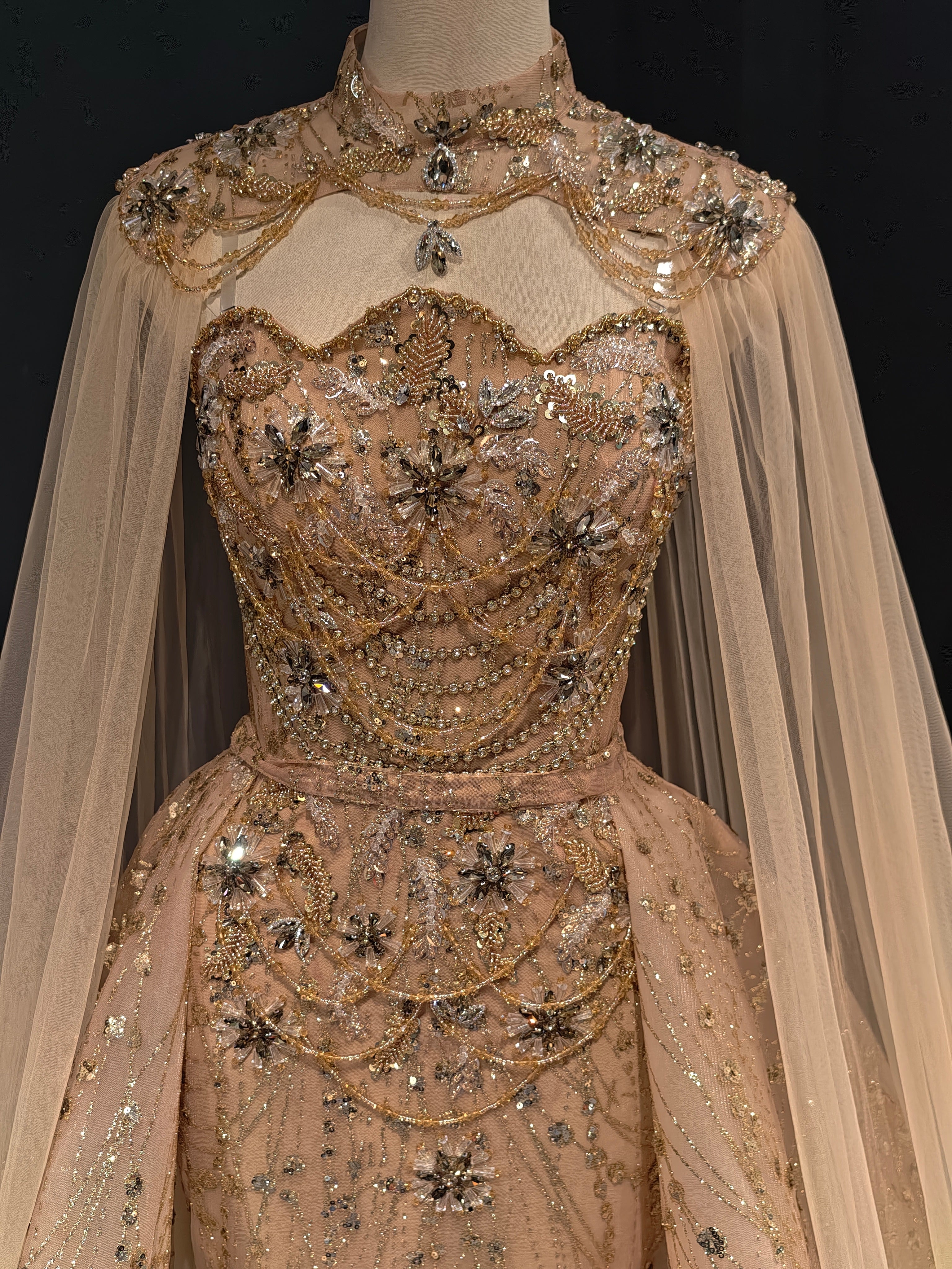 Champagne Gold Crystal Cape and Train Evening Gown — couture detail view (SKU-001) — reviewed generated product image