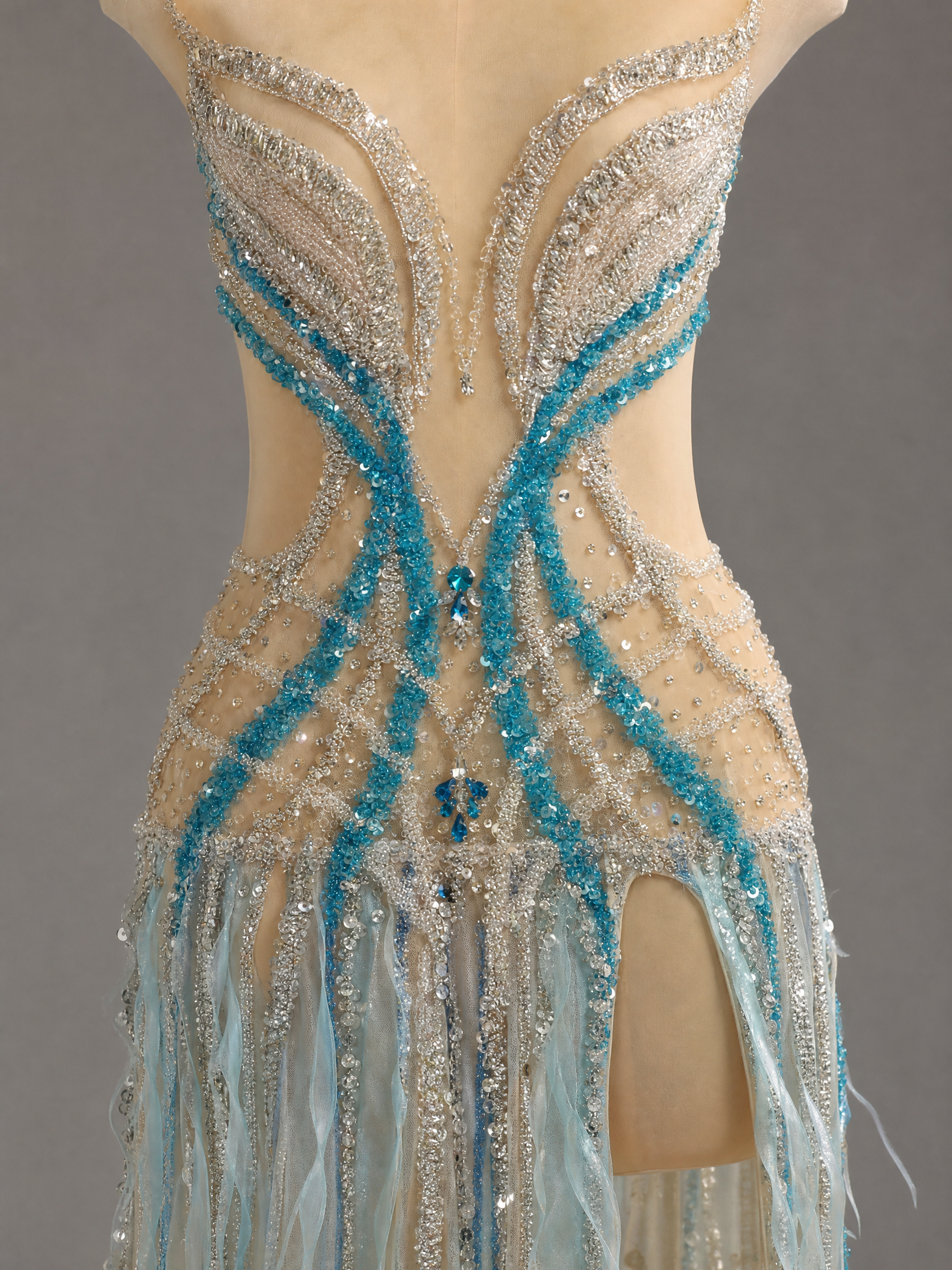 Ivory Train Linear Beadwork Pageant Gown — couture detail view (source SKU-046) — reviewed generated product image