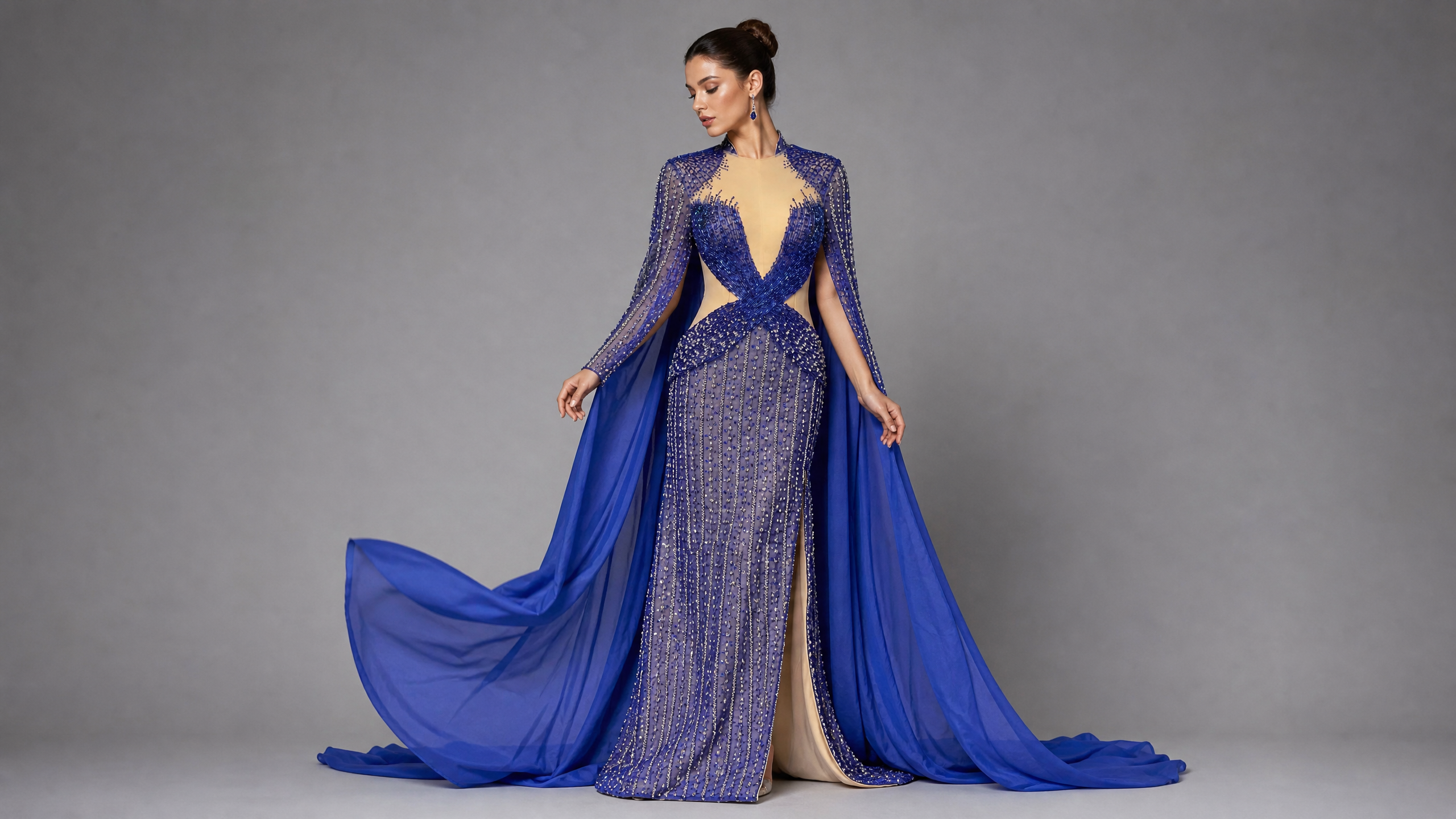 Royal Blue Tulle Cape and Train Pageant Gown — hem and train detail view (source SKU-042) — reviewed generated product image