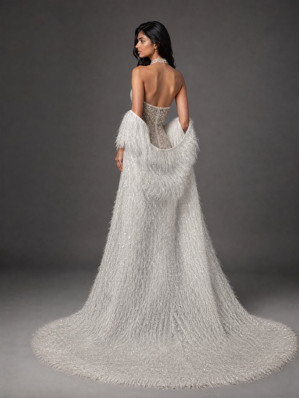 Silver White Feather Train Couture Evening Gown — three-quarter view (source SKU-055) — reviewed generated product image