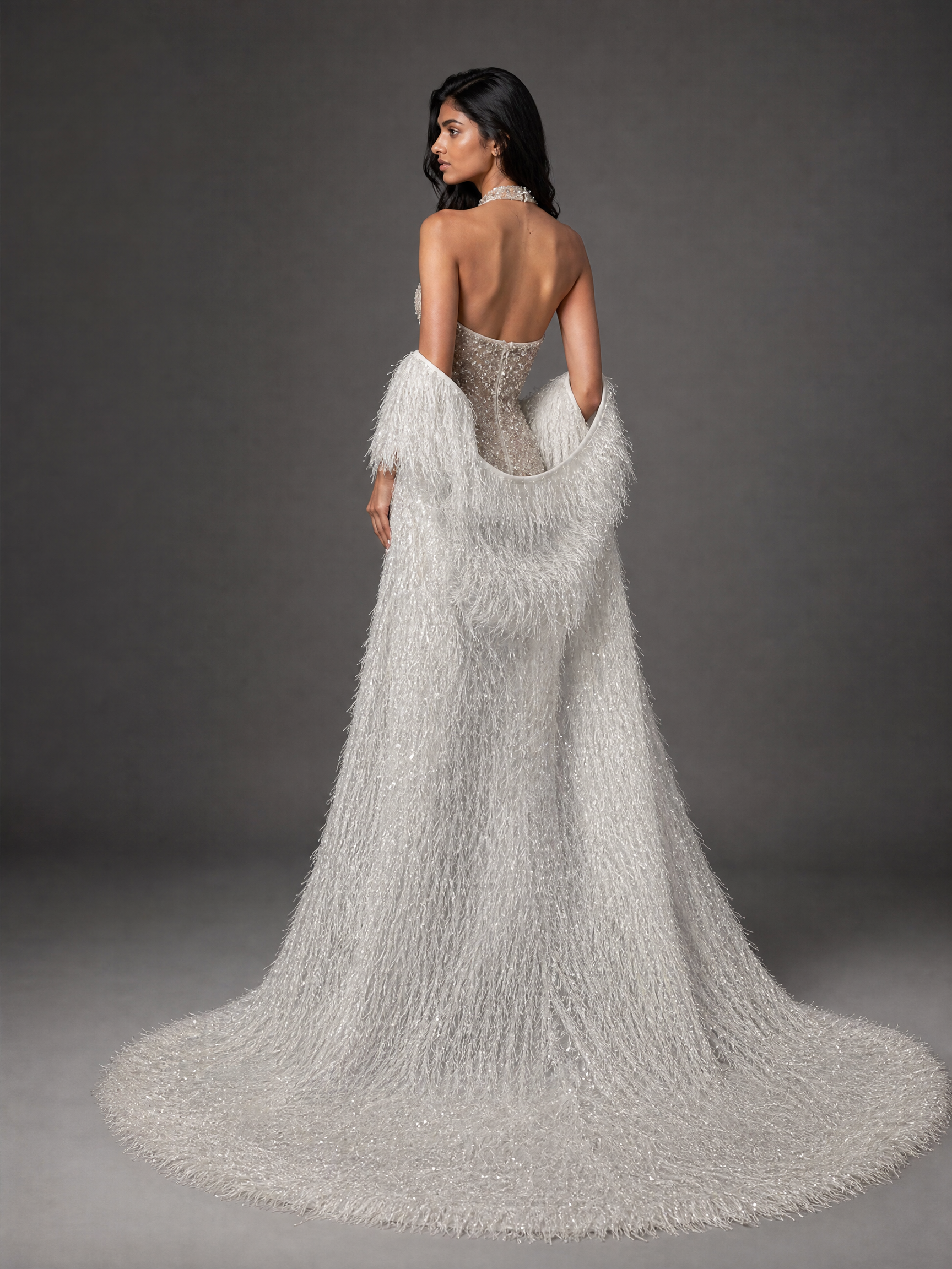 Silver White Feather Train Couture Evening Gown — three-quarter view (source SKU-055) — reviewed generated product image