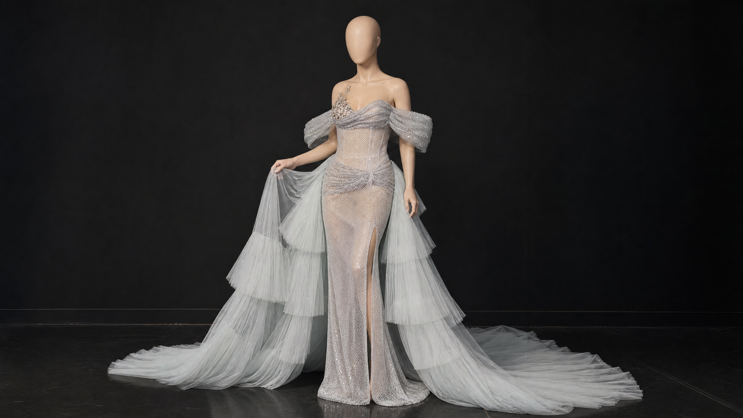 Silver White Ruffle Tiered Evening Gown — hem and train detail view (SKU-025) — reviewed generated product image